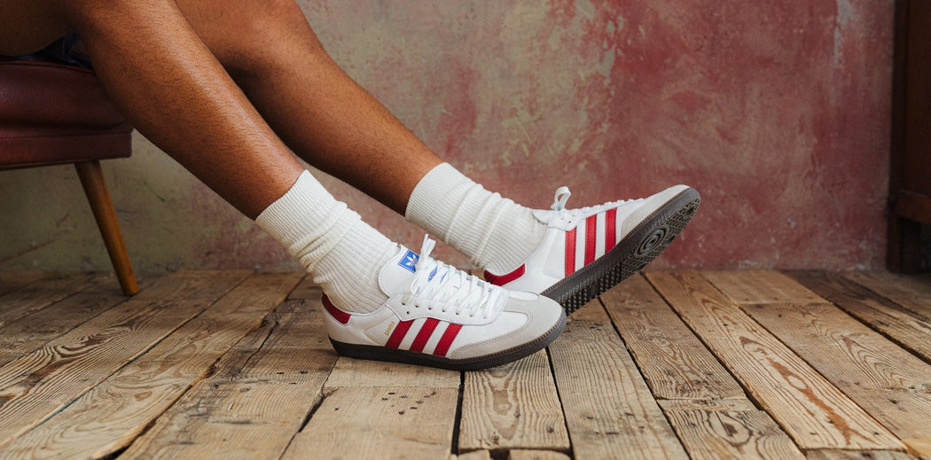 Vintage adidas Sampa shoes in iconic red and white design.