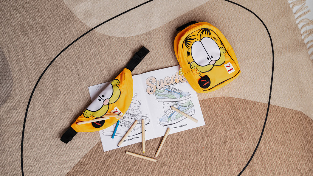 Kids' accessories featuring a Garfield pencil case.