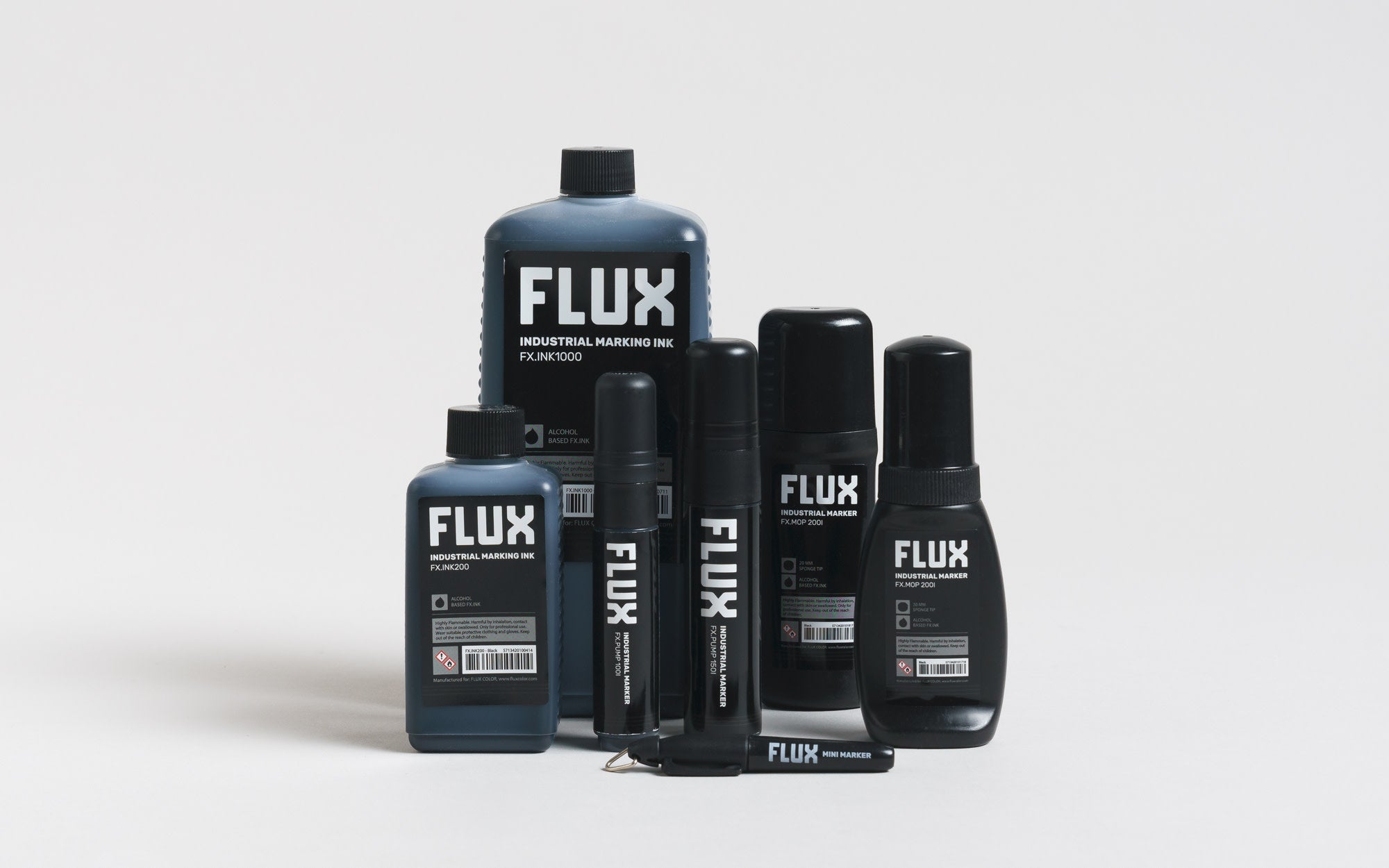 Various Flux products displayed on white surface.
