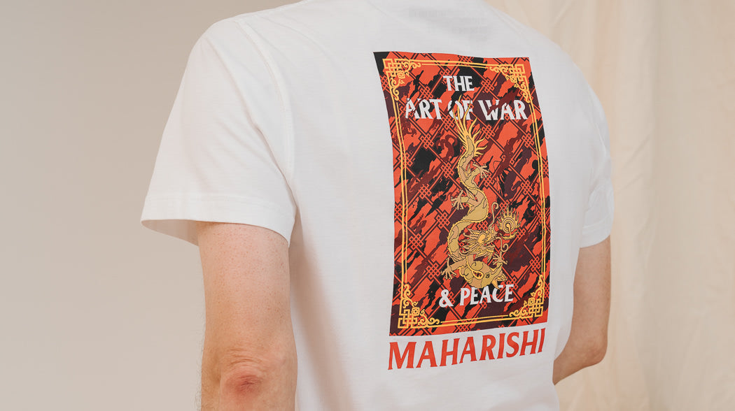 Back of a t-shirt with a red dragon by Maharishi.