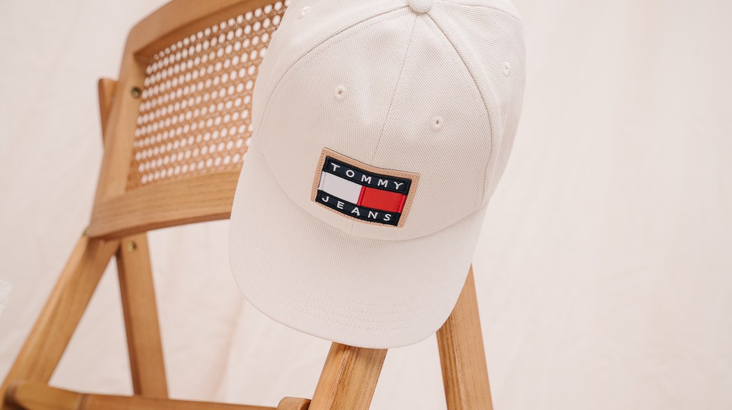 White Tommy Hilfiger hat with logo.